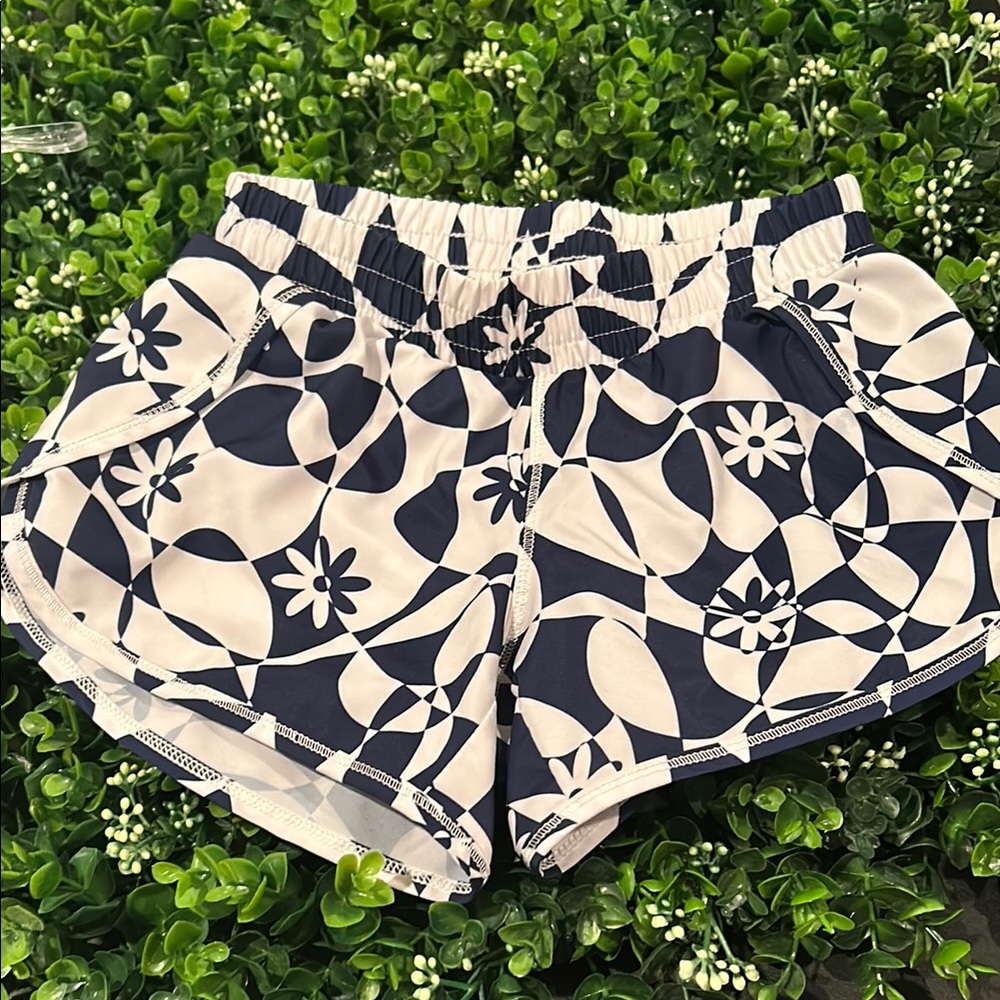 All in Motion Black and White Swim Trunks with Modern Aesthetic